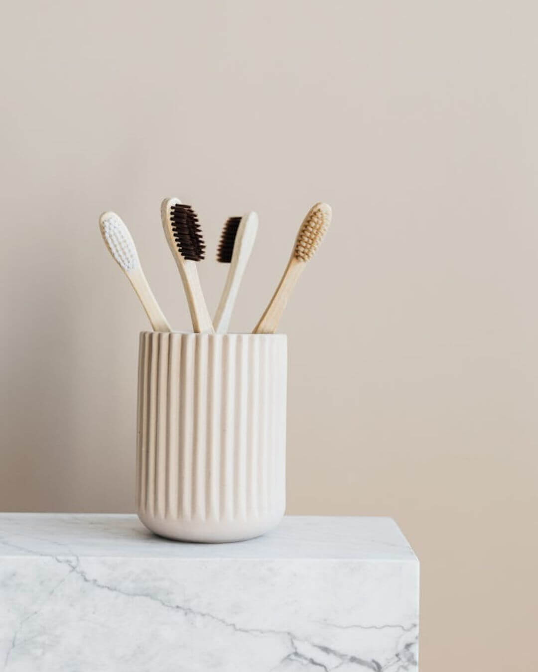 Eco-friendly toothbrushes in a cup